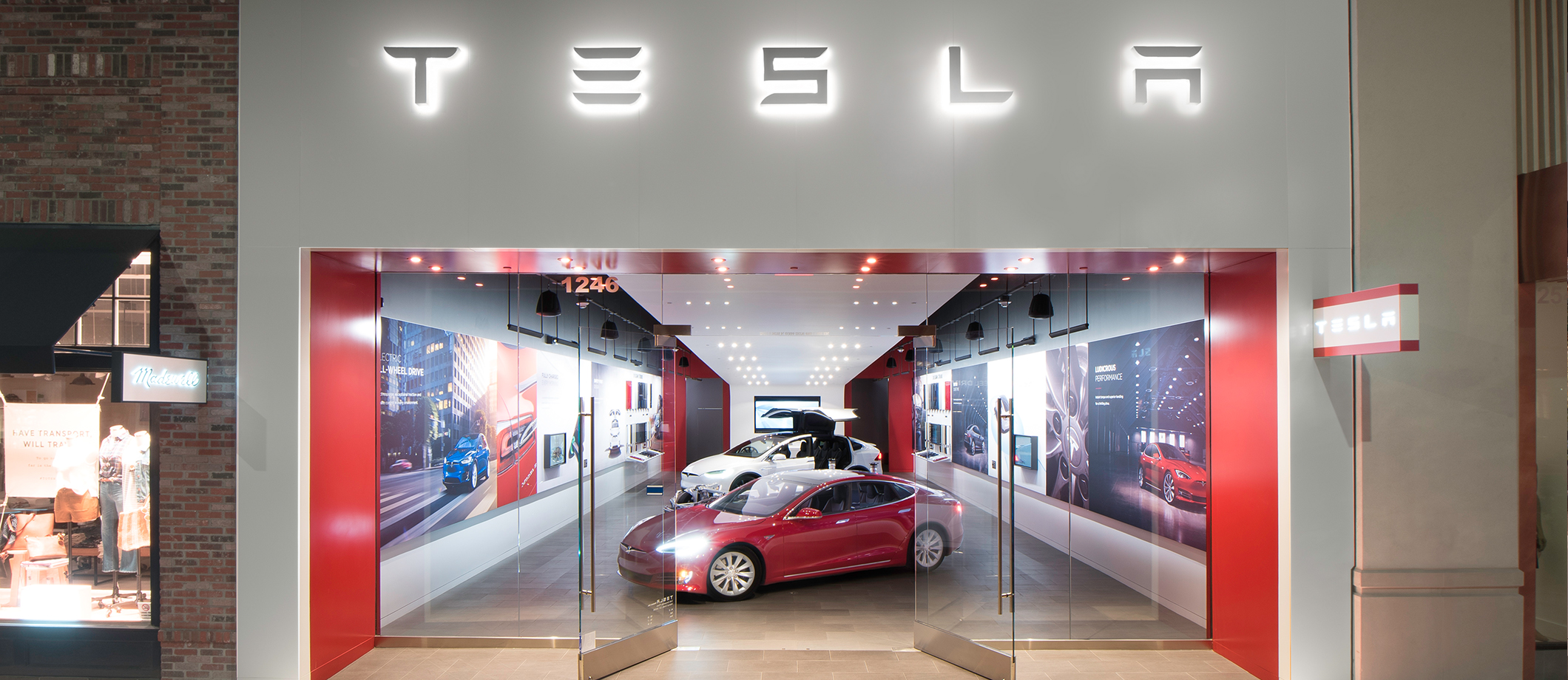 Tesla reverses course, will leave most stores open and raise prices slightly