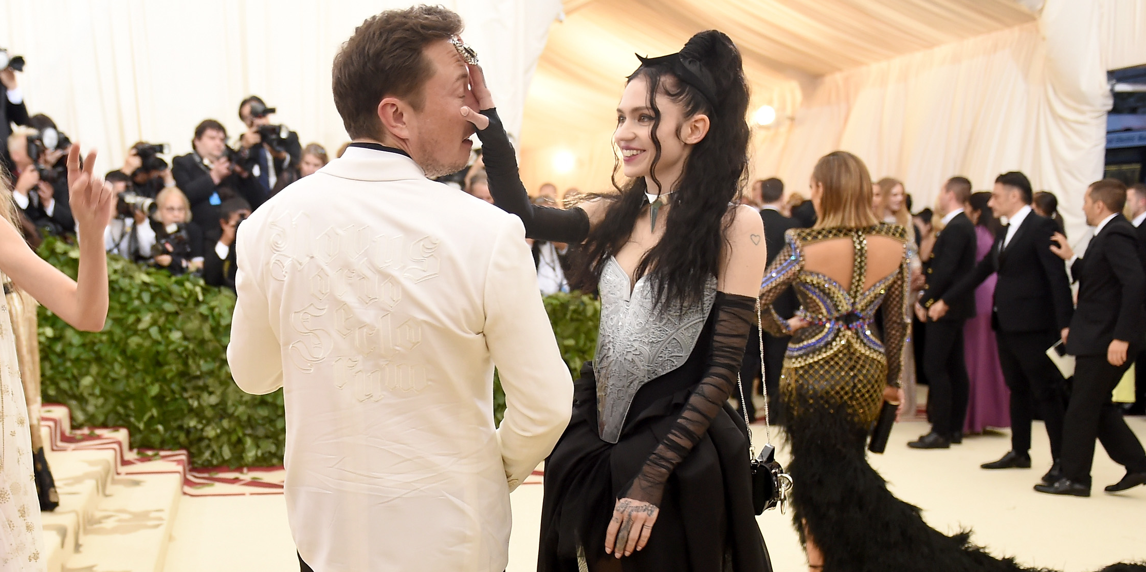 Elon Musk and Grimes might be expecting a baby — here’s where their relationship began and everything that’s happened since