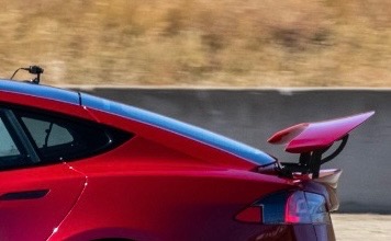 Tesla Model S Plaid hits Laguna Seca with giant rear wing in run-up to first deliveries